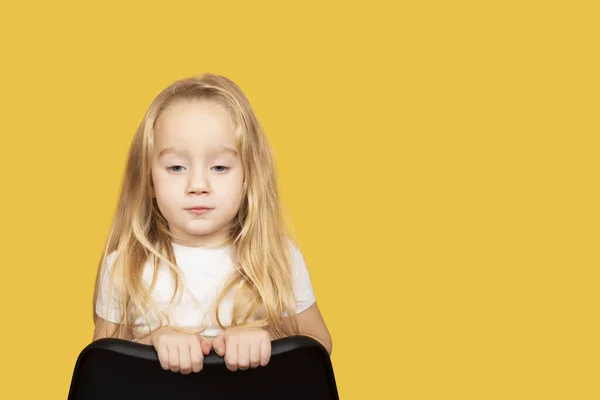 Beautiful Little Girl Blond Hair Sitting Chair Looking Thoughtfully Camera — Stock Photo, Image