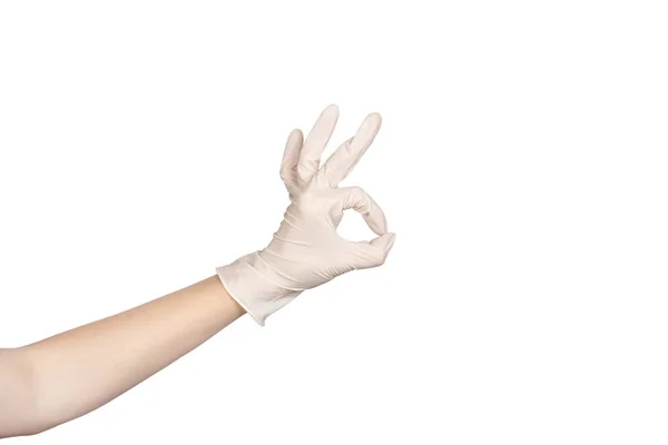 Χειραψία Χέρι Ένα Λευκό Γάντι Λατέξ Δείχνει Σημάδι Απομονώνονται Λευκό — Φωτογραφία Αρχείου