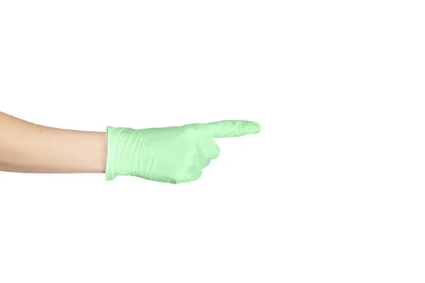 手拿着这个方向去跟随 交一只用白色隔离的一次性乳胶绿手套 白色上孤立的妇女的手势或手势 用手触摸或指向某物 复制空间 — 图库照片