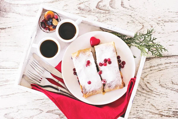 Strudel and coffee on a tray — Stock Photo, Image