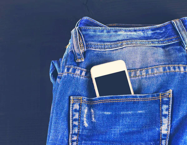 Phone in your pocket jeans — Stock Photo, Image