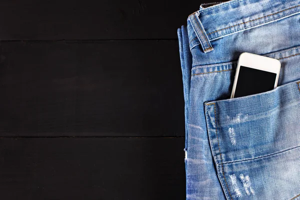 Phone in your pocket jeans — Stock Photo, Image