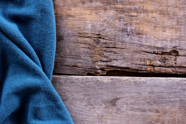 Punto a cuadros, suéter en tablas de madera viejas — Foto de Stock