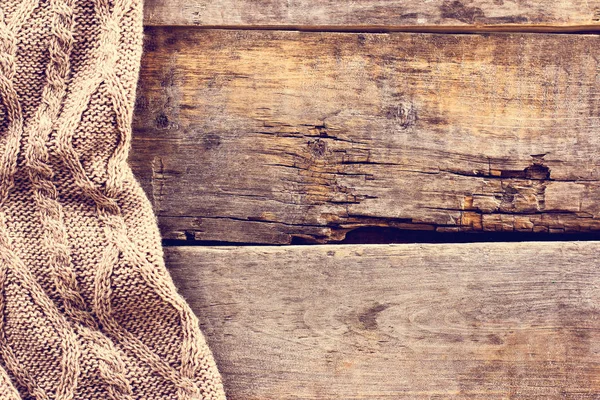 Punto a cuadros, suéter en tablas de madera viejas — Foto de Stock