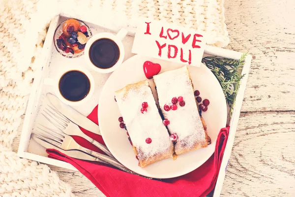 Strudel and coffee on a tray — Stock Photo, Image