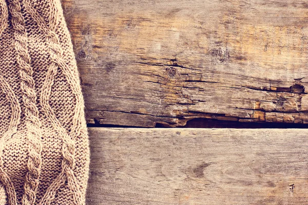 Punto a cuadros, suéter en tablas de madera viejas — Foto de Stock