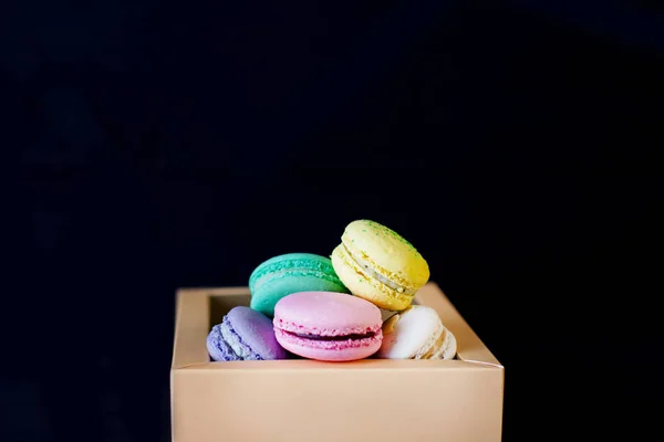 Multicolored macaroons in a box — Stock Photo, Image