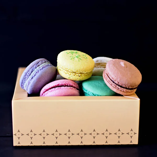 Multicolored macaroons in a box — Stock Photo, Image