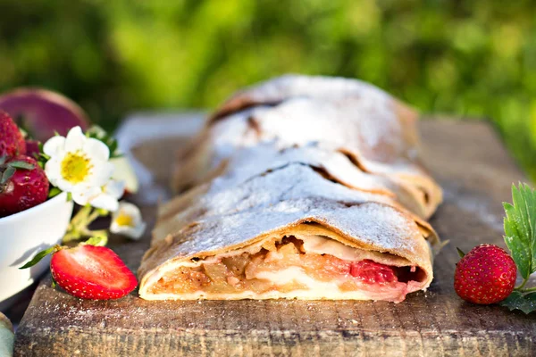 Strudel with apples and strawberries.