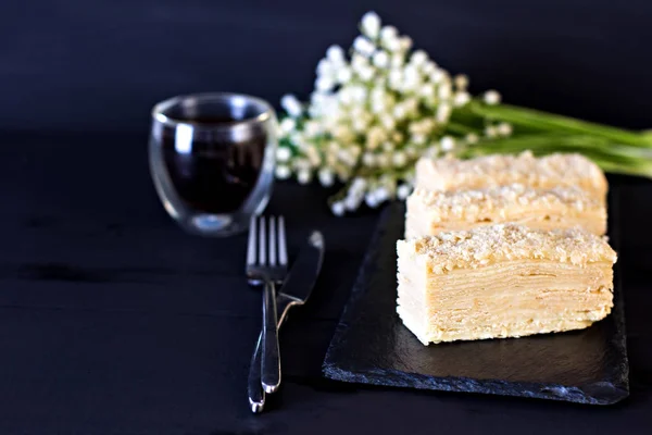 Napoleon cake on a dark background