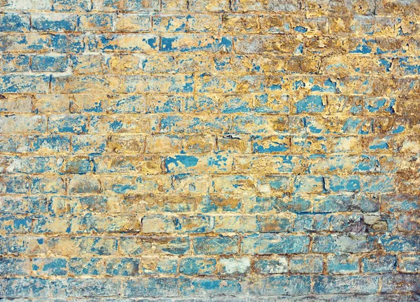 A brick-built, aged brick wall. A blue old brick wall. — Stock Photo, Image