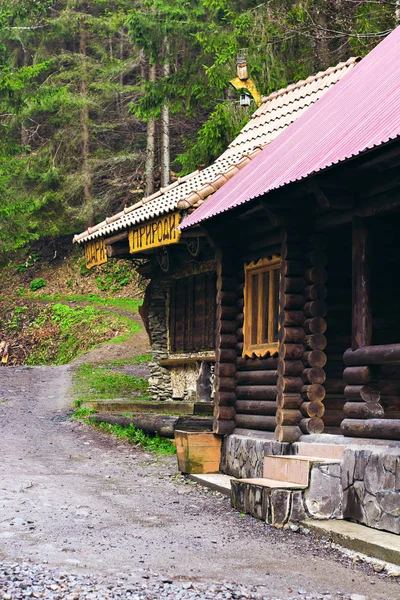 Wooden house in the forest, in the mountains.