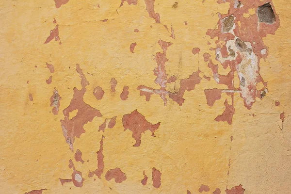 Die alte Mauer, die rissige Farbe. — Stockfoto