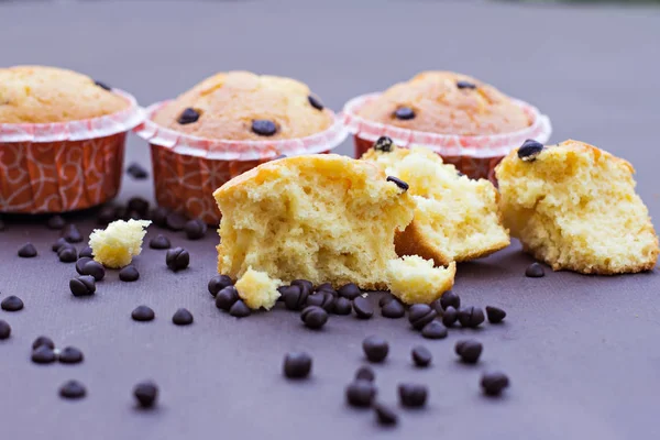 Homemade vanilla cupcakes with chocolate drops.