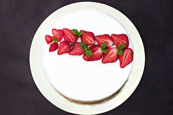 Cheesecake with strawberries. Cake decorated with strawberries.
