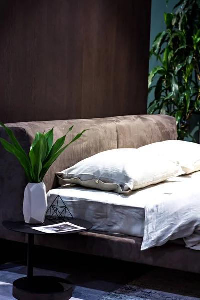 purple bed set in a beautiful minimalistic interior