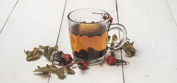 transparent mug with hot herbal tea