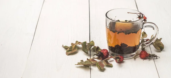 transparent mug with hot herbal tea