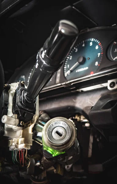 Engine start key hole of a old car — Stock Photo, Image