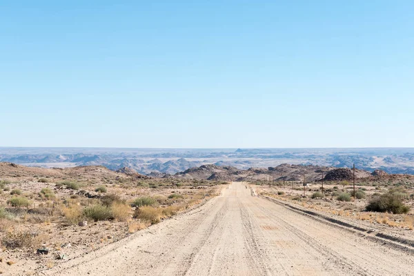 Carretera desde la carretera N14 hasta el puesto fronterizo de Onseepkans —  Fotos de Stock