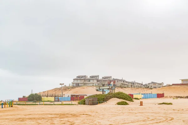 Houses on a dune and a waterpark in Henties Bay — Stock Photo, Image