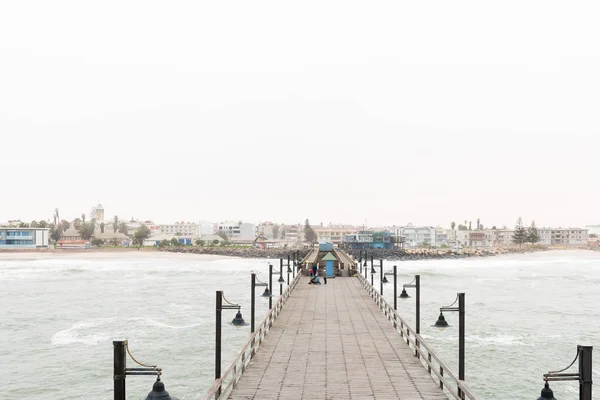 Misty view of Swakopmund in Namibia seen from historic jetty — Stock Photo, Image