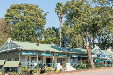 Vahşi incir ağacı alışveriş merkezi, Sabie ile sokak sahnesi.