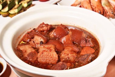 Braised pork with red yeast clipart