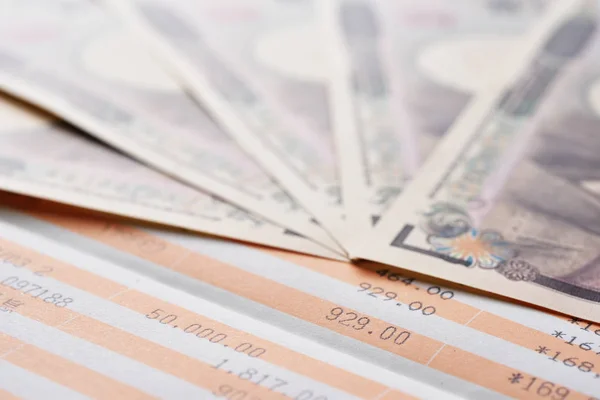 Saving account passbook and Japanese yen