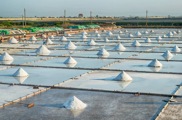 Dried salt at salt pan ready for harvesting in Tainan, Taiwan                                                                                                                                 Salt pans in Tainan, Taiwan