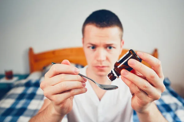 Sick man in bedroom — Stock Photo, Image