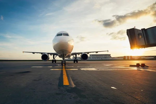 Airport at the amazing sunset — Stock Photo, Image