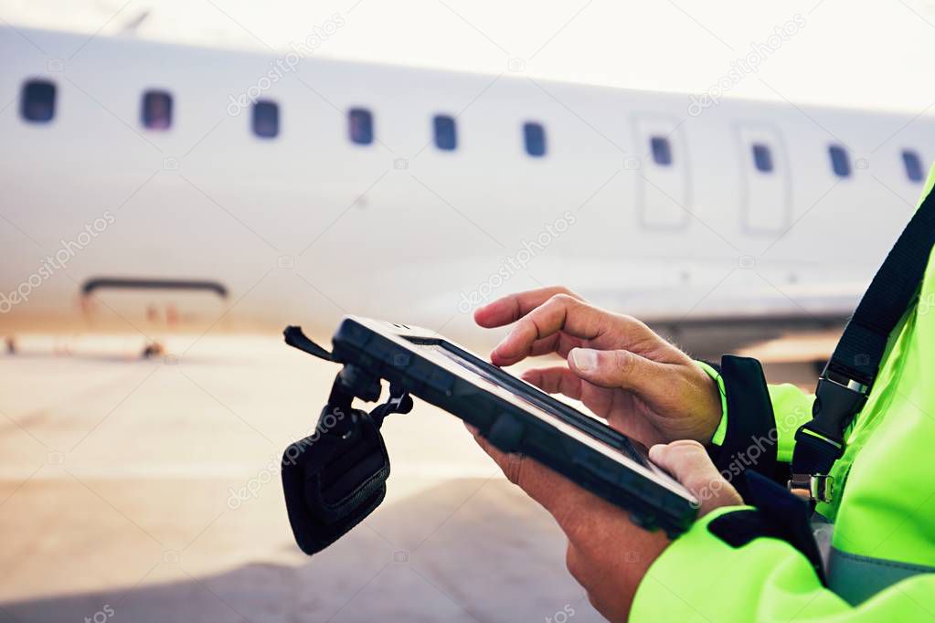 Preparations of passenger airplane at the airport