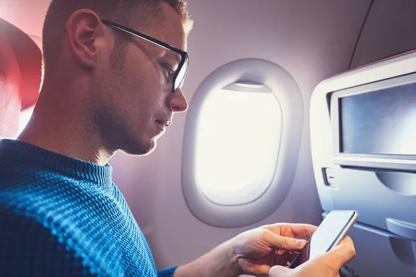 Connection in the airplane — Stock Photo, Image