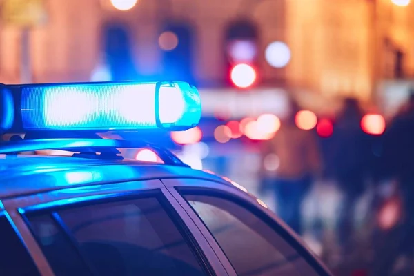 Carro da polícia na rua — Fotografia de Stock