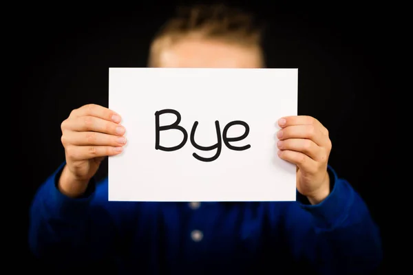 Kind houden teken met Spaanse woord Bye waardoor zie u Lat — Stockfoto