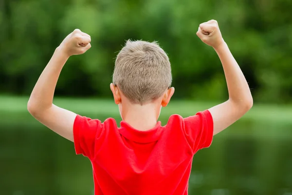 Kid with raised hands — Stock Photo, Image