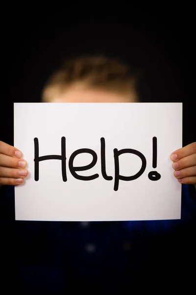 Child holding Help sign — Stock Photo, Image