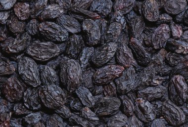 Arka plan, kurumuş siyah sultana üzümü, kuru üzüm