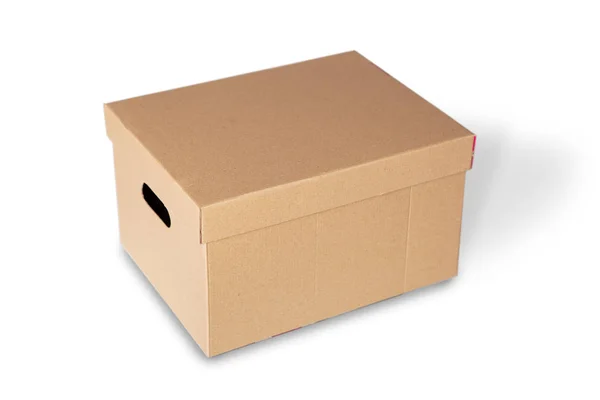 Closed cardboard box isolated on a white background — Stock Photo, Image