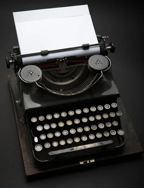 Antique Typewriter. Vintage Typewriter Machine on black