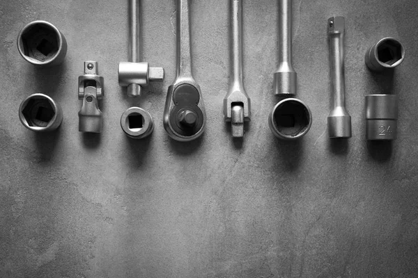 A top view image of hand tools. Set of tools on concrete panel b — Stock Photo, Image