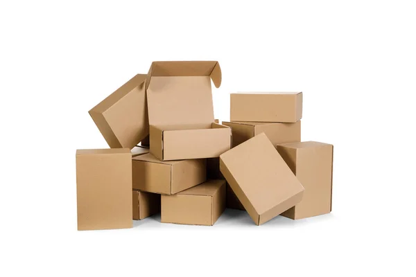 Piles of cardboard boxes on a white background — Stock Photo, Image