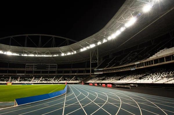 Estadio iluminado con proyectores — Foto de Stock