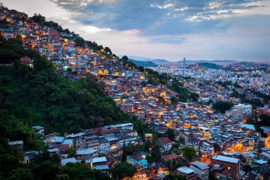View of Rio de Janeiro Slums on the Hills by Dusk clipart