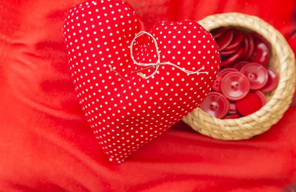 Red heart needle pillow