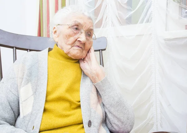 Elderly lady contemplating — Stock Photo, Image