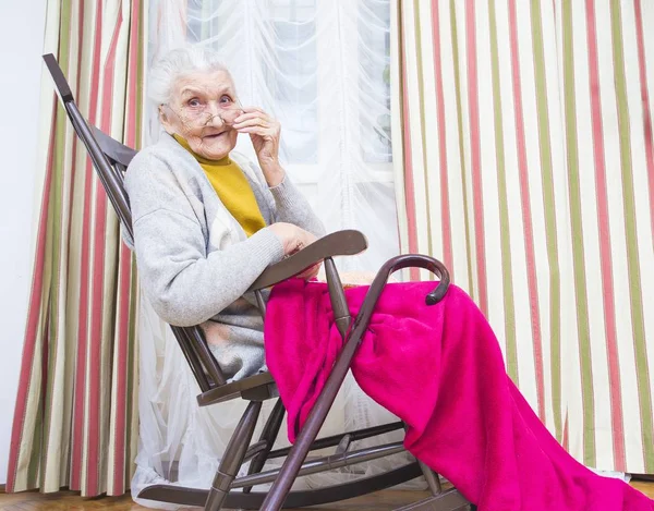 Grandmother in a chair — Stock Photo, Image