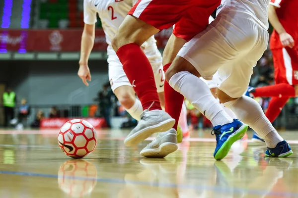 LUBIN, POLAND - 2 Aralık 2019: Futsal dostluk maçı Polonya Sırbistan 'a karşı 4: 1. Futsal - oyuncunun bacaklarını ve topunu kapat