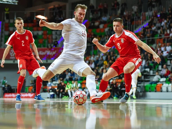 LUBIN, POLAND - 2 Aralık 2019: Futsal dostluk maçı Polonya Sırbistan 'a karşı 4: 1. Harekette Ninoslav Aleksiç (2), Michal Marek (14) ve Darko Ristiç (8)).